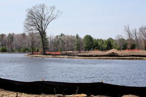 The new & improved 13th hole at SentryWorld, which now has a 200-yard carry off the tee to a wide fairway, required some major construction and a new bridge.